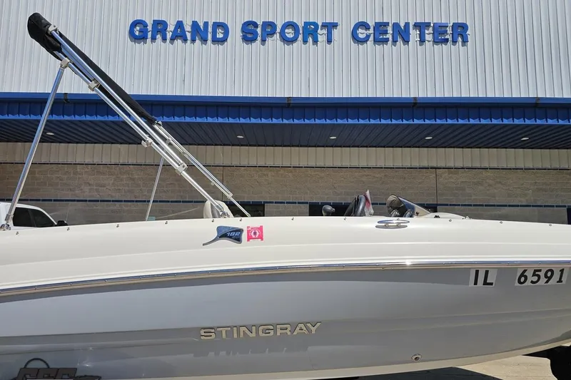 Slide: The Image of 2023 Stingray 182 SC boat at Grand Sport Center dealership. - 4