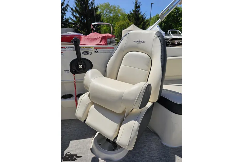 Slide: The Image of Captain's chair on 2023 Stingray 182 SC boat, featuring ergonomic design and premium materials. - 54