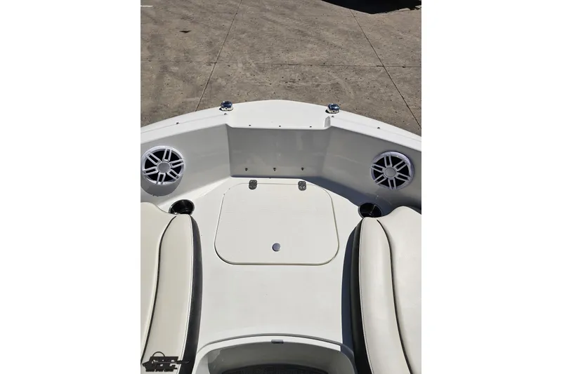 Slide: The Image of 2023 Stingray 182 SC boat interior with speakers and seating, showcasing modern design. - 73