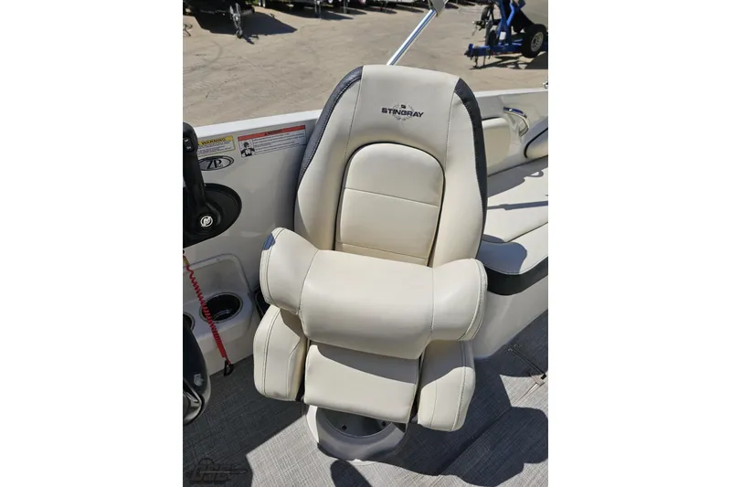 Slide: The Image of 2023 Stingray 182 SC boat seat, featuring plush beige upholstery and ergonomic design. - 78