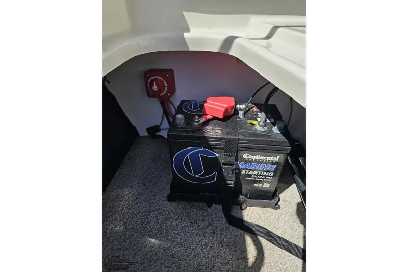 Slide: The Image of Marine battery setup in 2023 Stingray 182 SC boat, featuring Continental Marine Starting battery. - 81