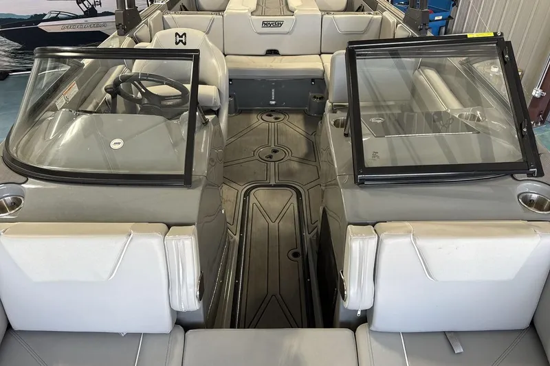 Slide: The Image of 2024 Heyday WTSurf boat interior with sleek seating and modern design. - 12