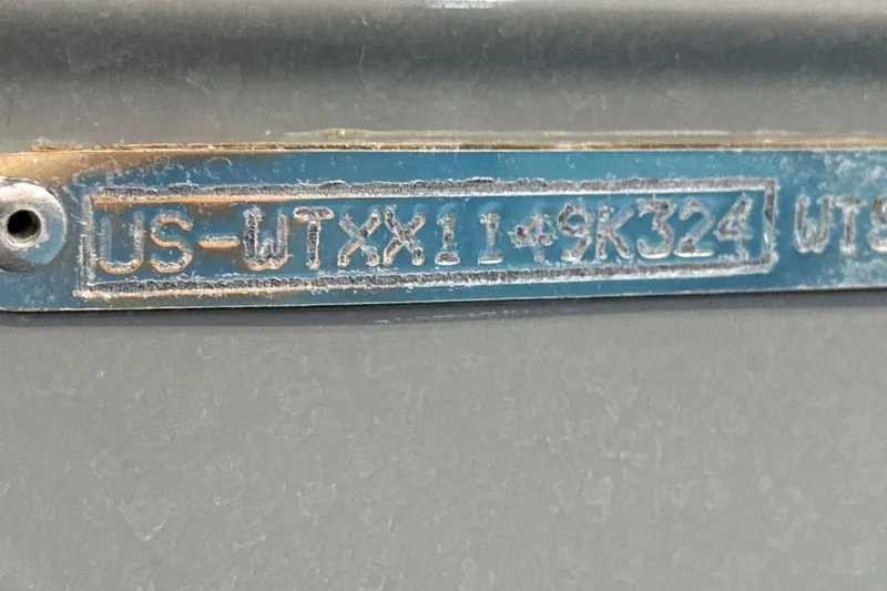 Slide: The Image of Close-up of a 2024 Heyday WTSurf boat identification plate with serial number. - 24