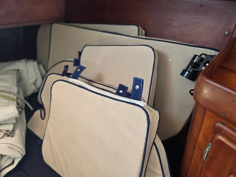 Slide: The Image of Interior of a 1995 Freedom Sloop with sailing accessories. - 13