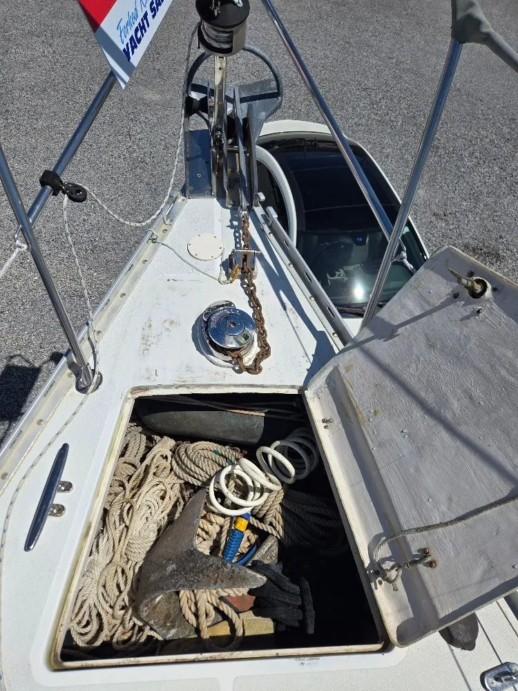 Slide: The Image of Anchor locker of a 1995 Freedom sloop with ropes and anchor. - 20