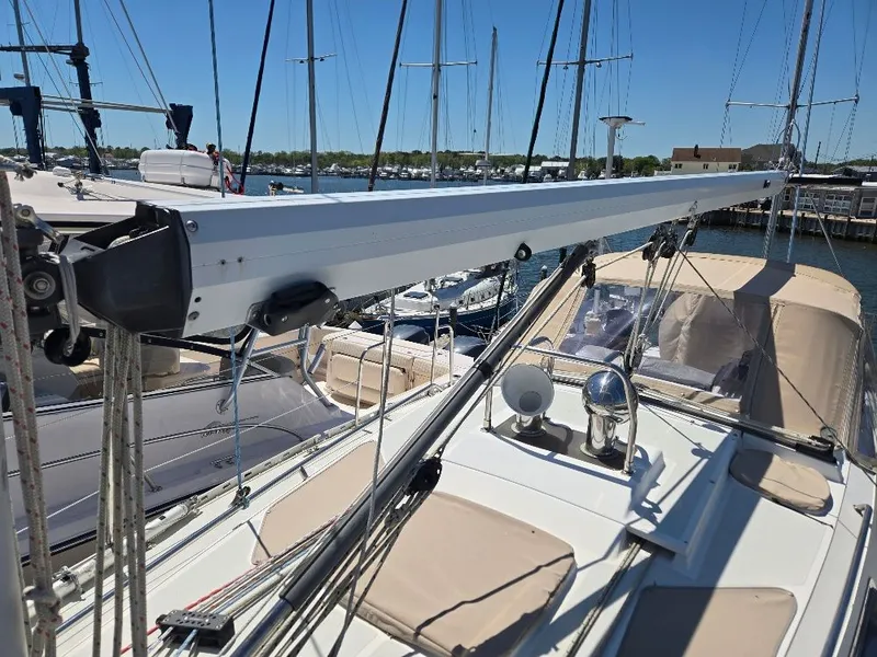 Slide: The Image of 1995 Freedom sloop with sailing equipment in harbor. - 22