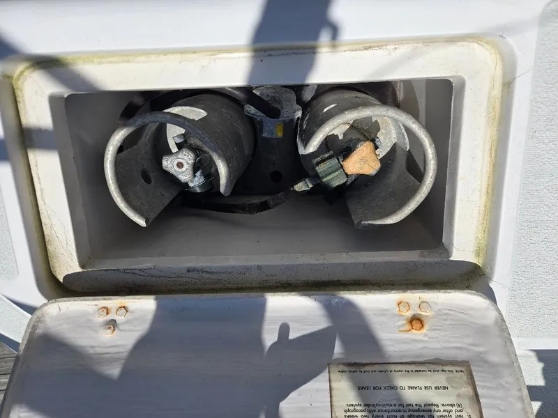 Slide: The Image of Gas connection on a 1995 Freedom Sloop boat. - 27