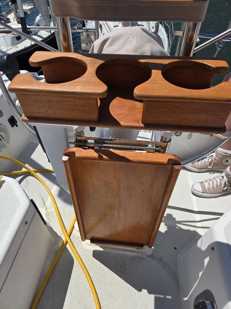 Slide: The Image of Wooden cup holder on a 1995 Freedom sloop boat. - 34