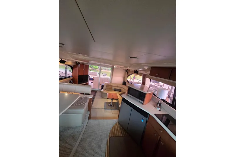 Slide: The Image of Interior of 2006 Meridian 411 Sedan yacht with modern furnishings and appliances. - 13