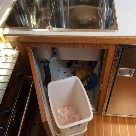 Slide: The Image of Modern kitchen sink area in Catalina 426 yacht, featuring dual sinks and storage. - 20
