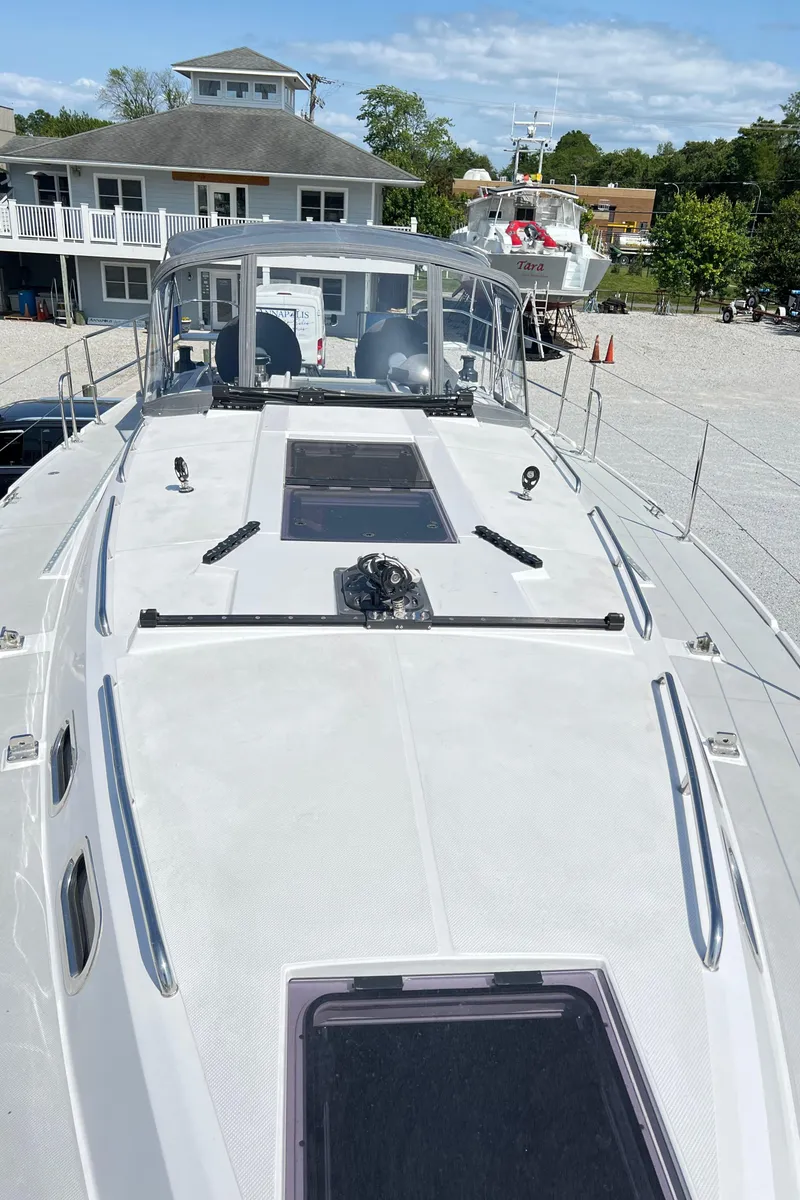 Slide: The Image of 2026 Catalina 426 yacht docked, showcasing sleek deck design and modern features. - 3