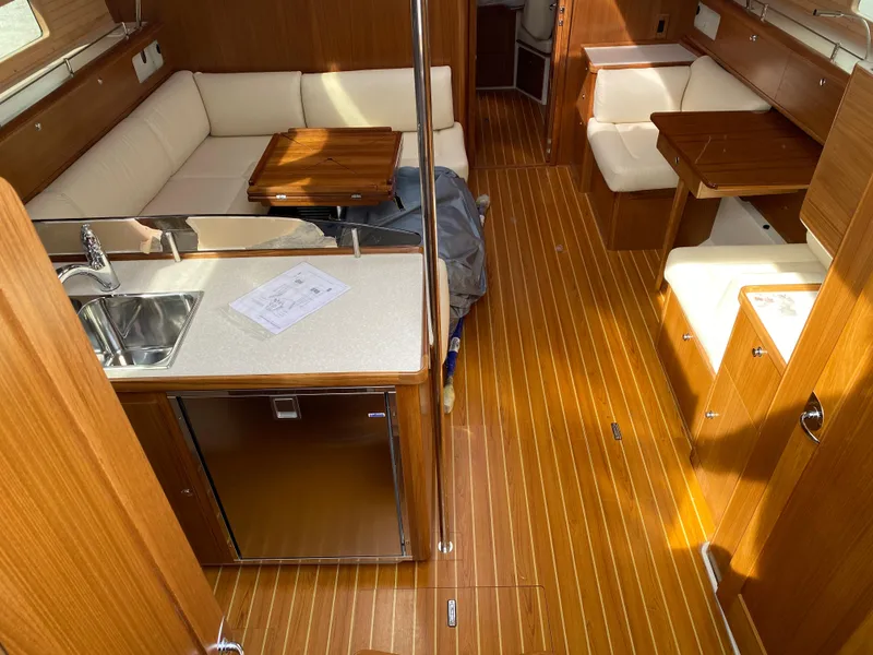 Slide: The Image of Luxurious interior of 2026 Catalina 426 yacht with wood flooring and cozy seating. - 5