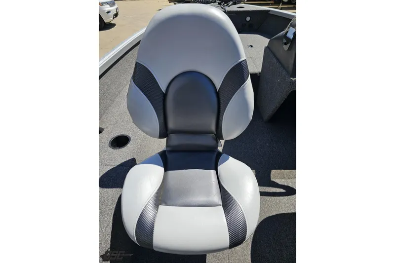 Slide: The Image of 2014 Alumacraft Classic 165 boat seat, gray and black design, on deck. - 34