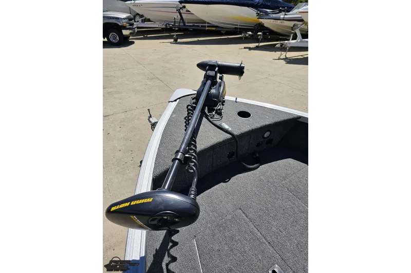 Slide: The Image of 2014 Alumacraft Classic 165 boat with Minn Kota trolling motor on deck. - 56