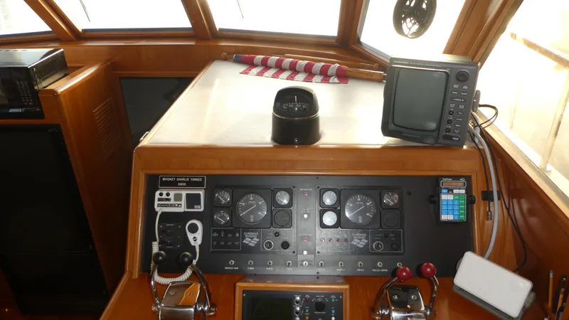 Slide: The Image of Ocean Alexander 456 Classicco 1992 yacht helm with navigation instruments and controls. - 15