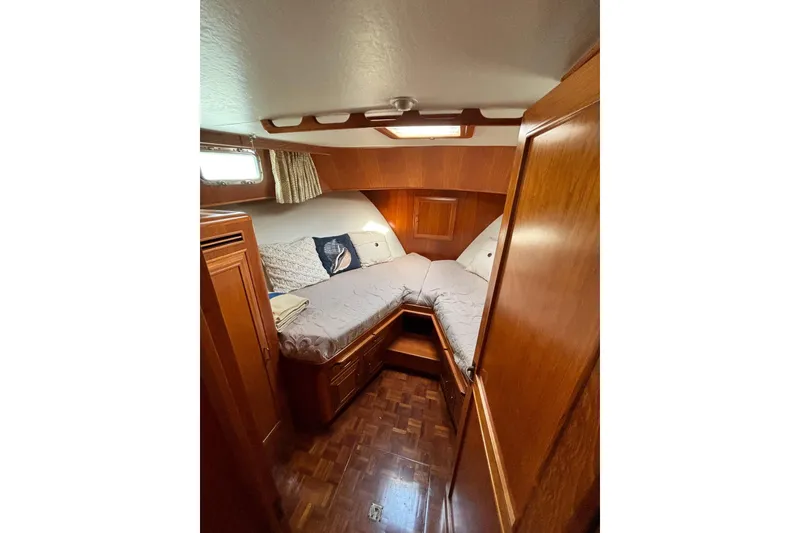 Slide: The Image of Cozy cabin interior of 1992 Ocean Alexander 456 Classicco yacht with wooden furnishings. - 19