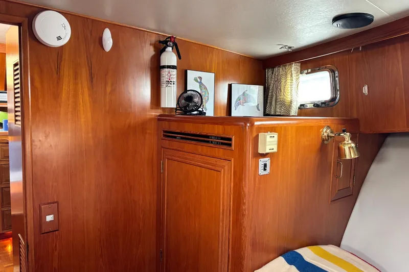 Slide: The Image of Interior of 1992 Ocean Alexander 456 Classicco with wood paneling and nautical decor. - 21