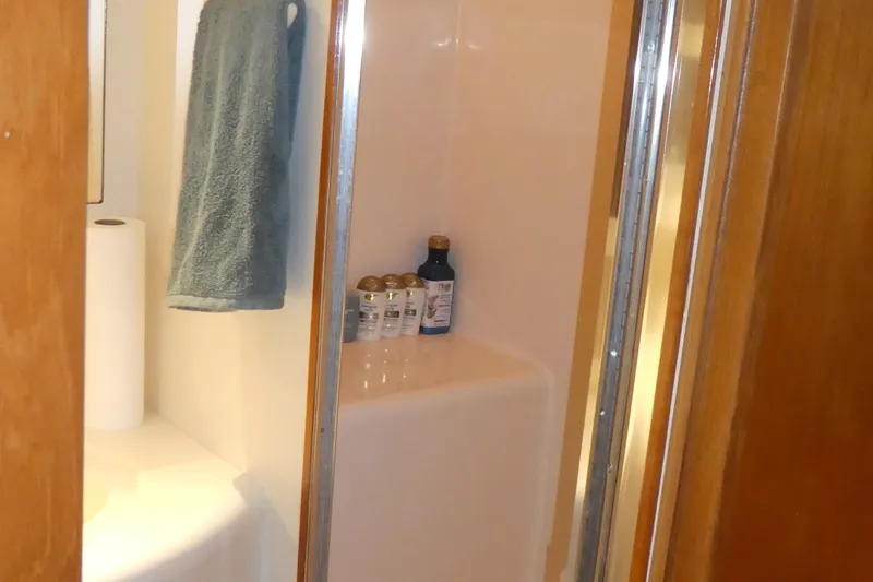 Slide: The Image of Shower area in 1992 Ocean Alexander 456 Classicco yacht with toiletries and towel. - 24