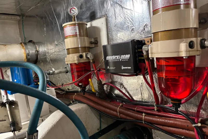 Slide: The Image of Engine room of 1992 Ocean Alexander 456 Classicco with filtration system and wiring. - 48