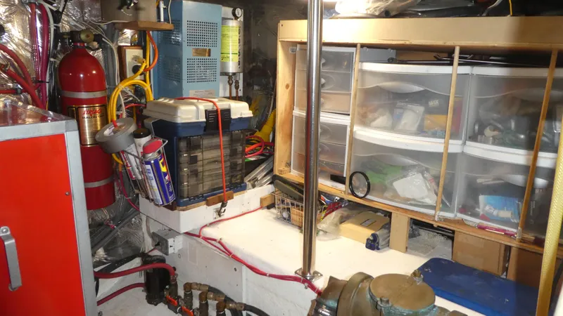 Slide: The Image of Engine room of 1992 Ocean Alexander 456 Classicco with storage and equipment. - 50
