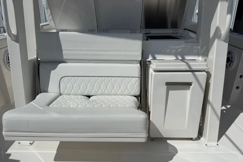 Slide: The Image of Luxurious seating on 2026 Pursuit S 358 Sport boat, featuring elegant white upholstery. - 21