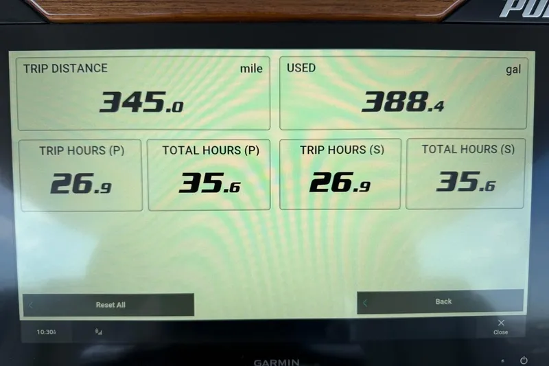 Slide: The Image of Display screen showing trip data: 345 miles, 388.4 gallons used, 2026 Pursuit S 358 Sport. - 36