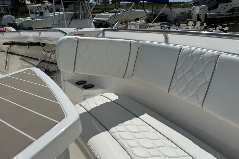 Slide: The Image of Luxurious seating on 2026 Pursuit S 358 Sport boat, featuring elegant white upholstery. - 42