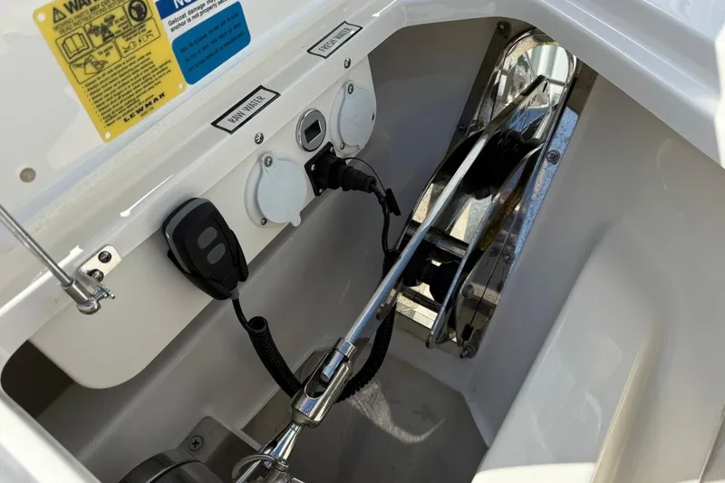 Slide: The Image of 2026 Pursuit S 358 Sport boat control panel with rain and fresh water outlets. - 44