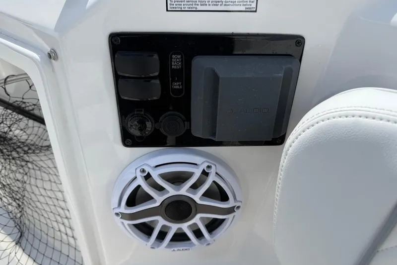 Slide: The Image of Control panel and speaker on 2026 Pursuit S 358 Sport boat. - 47