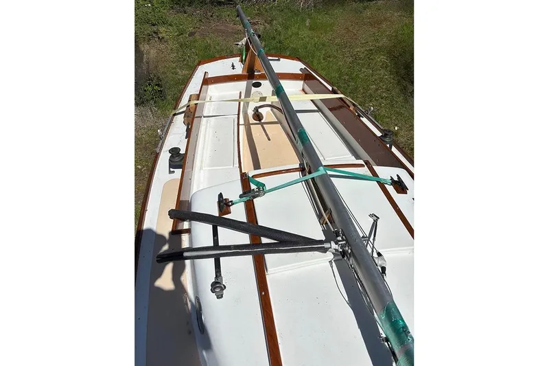 Slide: The Image of 1977 Cape Dory Typhoon Weekender sailboat deck with mast and rigging details. - 6