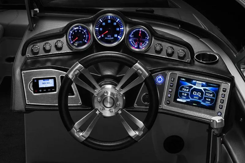 Slide: The Image of Manufacturer Provided Image: 2018 MasterCraft XT23 boat dashboard with illuminated gauges and touchscreen controls. - 14