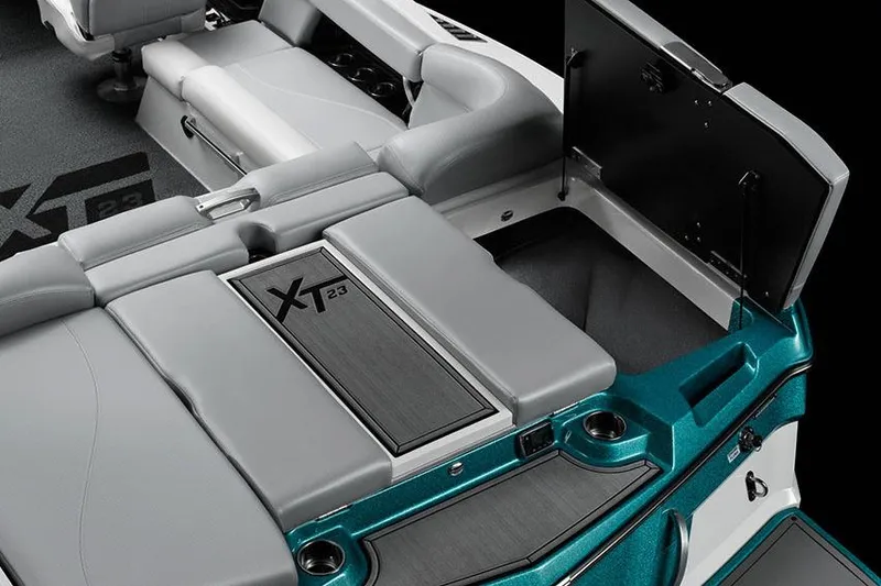 Slide: The Image of Manufacturer Provided Image: 2018 MasterCraft XT23 boat interior with storage compartments and seating. - 16