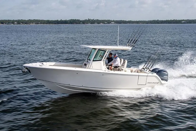 Slide: The Image of Manufacturer Provided Image: 2026 Sailfish 272 CC boat cruising on open water, equipped with fishing rods. - 1
