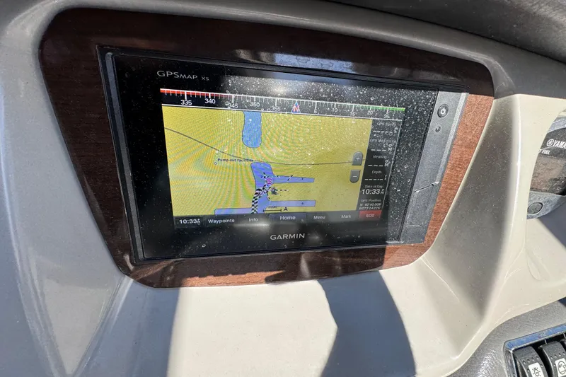 Slide: The Image of Garmin GPS display on 2018 Chaparral 250 Suncoast boat dashboard. - 12