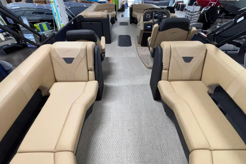 Slide: The Image of Luxurious interior of 2026 Evotti 525QL boat with beige seating and modern dashboard. - 10