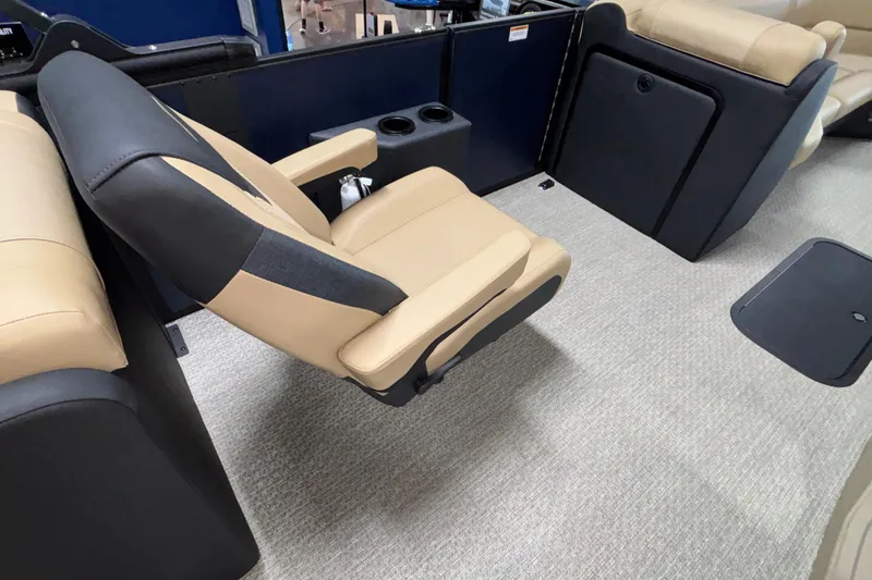 Slide: The Image of Luxurious seating in 2026 Evotti 525QL boat interior, featuring beige and black upholstery. - 14