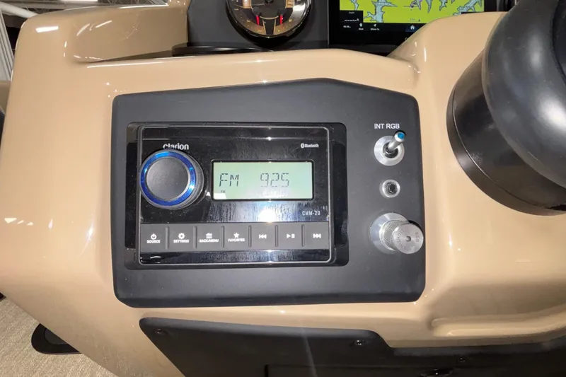 Slide: The Image of Dashboard of 2026 Evotti 525QL featuring a Clarion radio display. - 21