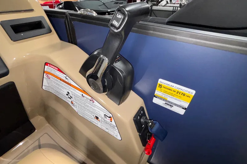 Slide: The Image of Control panel of 2026 Evotti 525QL boat, featuring capacity and safety labels. - 22