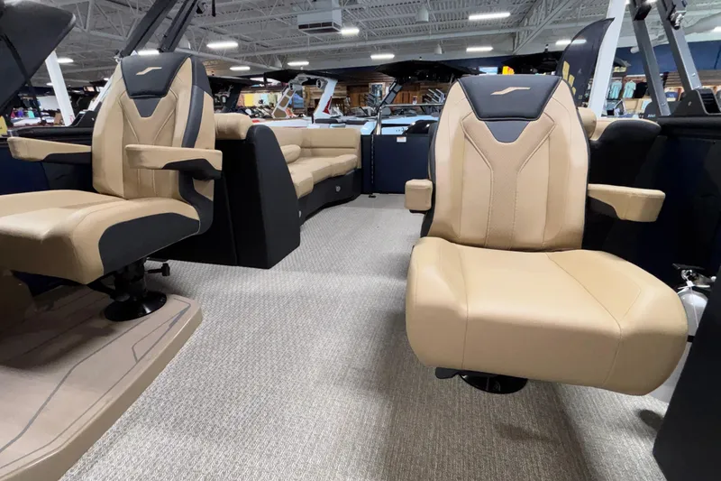 Slide: The Image of Luxury seating in 2026 Evotti 525QL boat, featuring beige and black upholstery. - 26