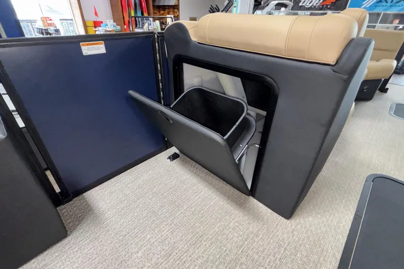 Slide: The Image of Interior of 2026 Evotti 525QL boat with open storage compartment. - 28