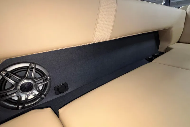 Slide: The Image of 2026 Evotti 525QL interior with beige seating and integrated speaker system. - 32