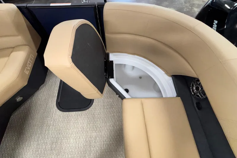 Slide: The Image of Evotti 525QL 2026 boat interior with tan seating and storage compartment. - 36