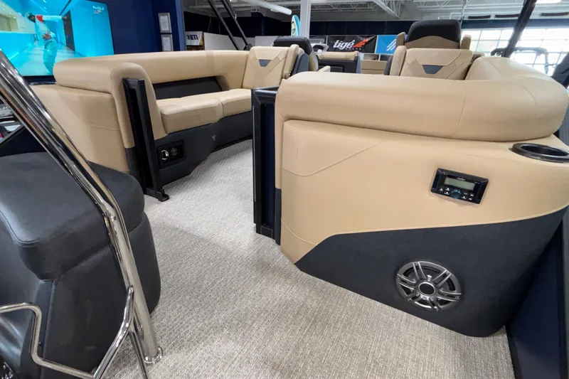 Slide: The Image of Luxurious interior of 2026 Evotti 525QL boat with beige seating and modern audio system. - 7