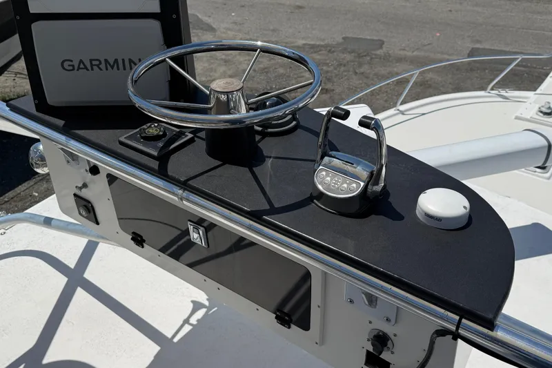 Slide: The Image of Steering console of a 2000 Dawson Yachts Express with Garmin navigation system. - 11