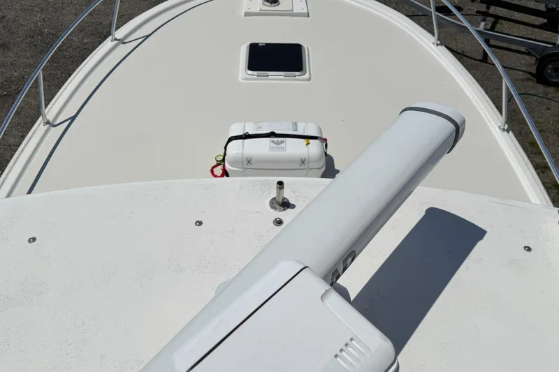 Slide: The Image of Bow view of 2000 Dawson Yachts Express, featuring deck equipment and railing. - 9