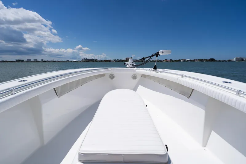 Slide: The Image of 2007 Yellowfin 34 Offshore boat on calm waters under a clear blue sky. - 15