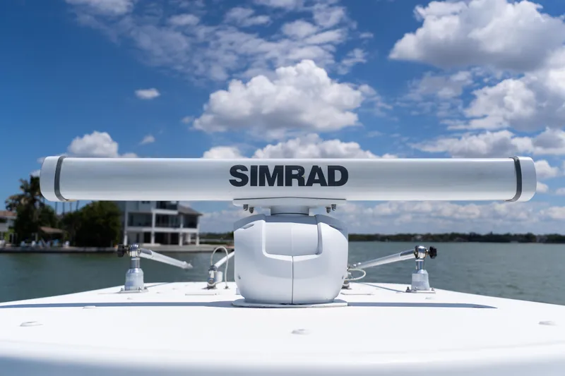Slide: The Image of Simrad radar on 2007 Yellowfin 34 Offshore boat under blue sky. - 20