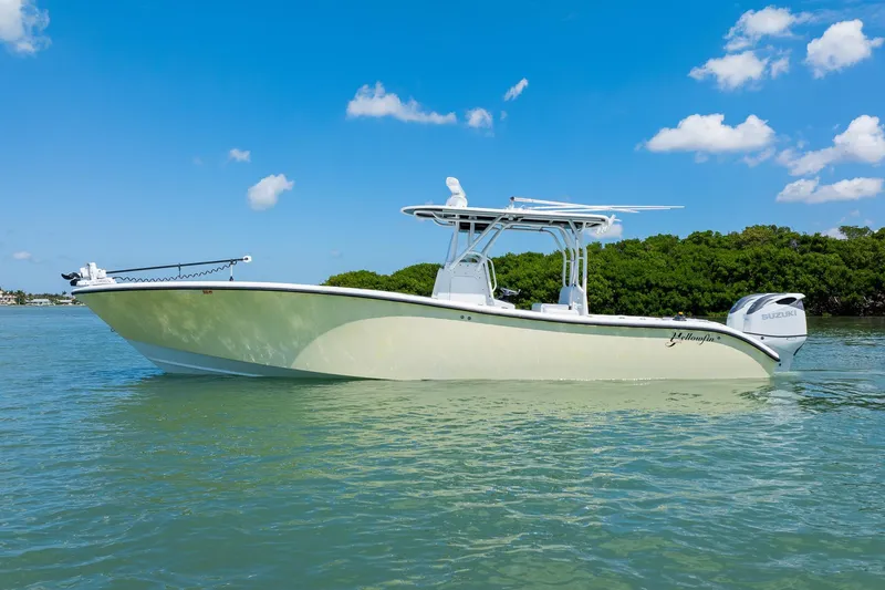 Slide: The Image of 2007 Yellowfin 34 Offshore boat on calm water under blue sky. - 4
