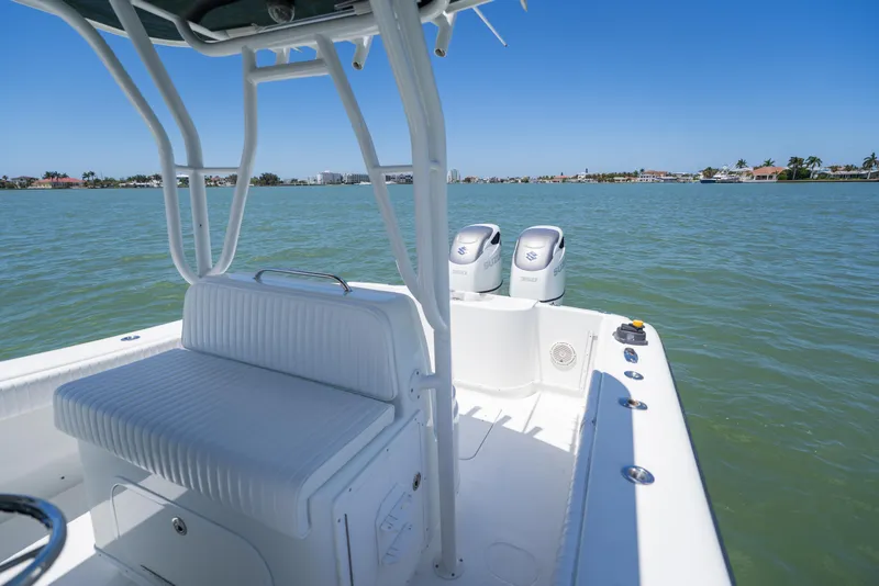 Slide: The Image of 2007 Yellowfin 34 Offshore boat with dual Suzuki engines on calm water. - 45