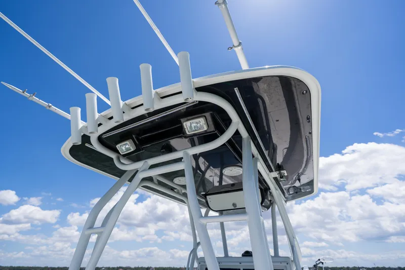 Slide: The Image of 2007 Yellowfin 34 Offshore boat tower against a clear blue sky. - 48